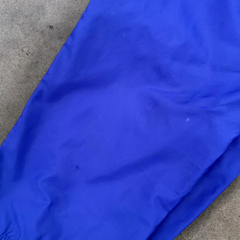 Vintage Y2K Era Nike Medium Royal Blue Nylon Windbreaker Track Pants 2007 Mens
